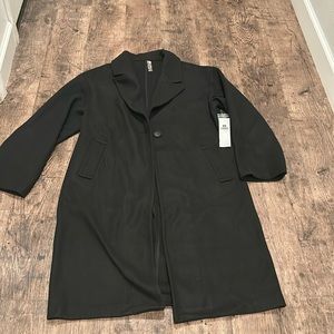 Women’s brand new size L black coat. hits at the knee